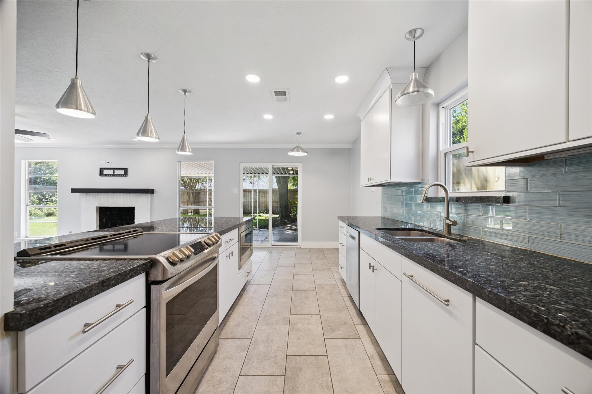 9407 Meadowbriar Lane Houston, TX 77063 - Photo 13 of 25 Lots of storage and abundant lighting.