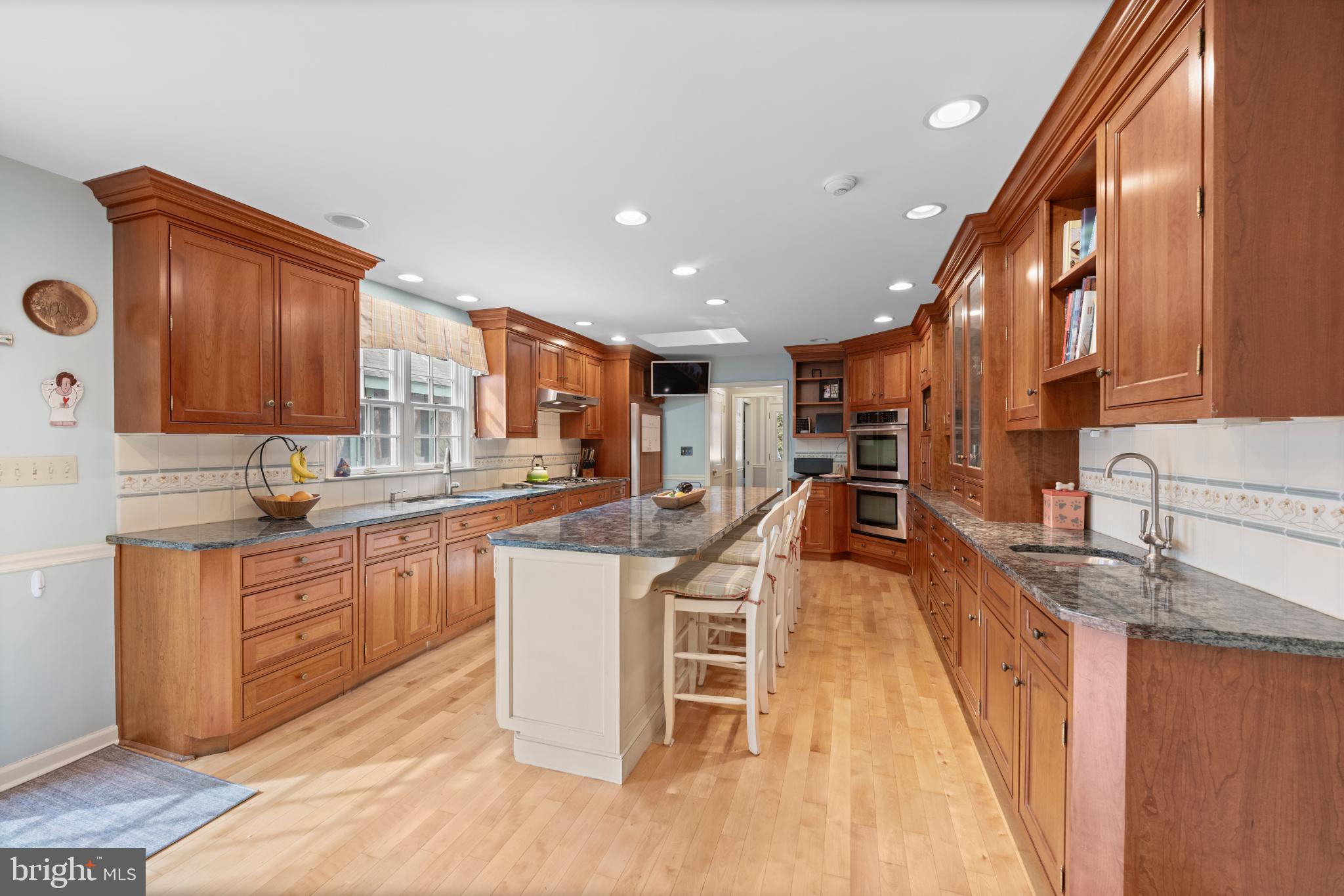 714 Gulph Road Wayne, PA 19087 - Photo 35 of 49 Spacious kitchen with elegant wood cabinetry.