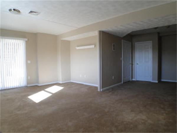 315 Ridge Road, Unit 2 Revere, MA 02151 - Photo 5 of 5 an empty room with windows