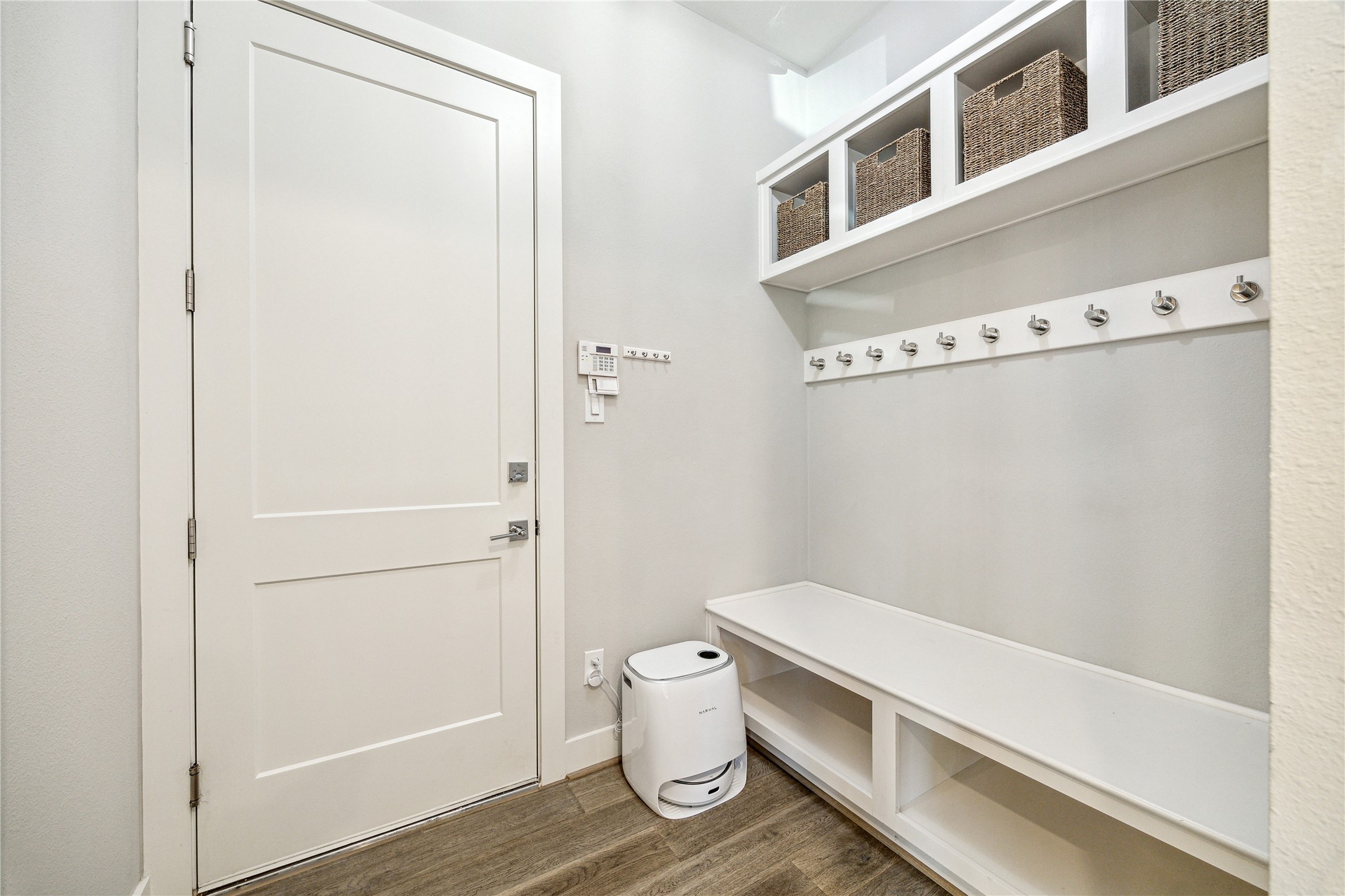 603 Vincent Street Houston, TX 77009 - Photo 15 of 26 The thoughtfully designed mud room is equipped with shelving and coat rack + bench.