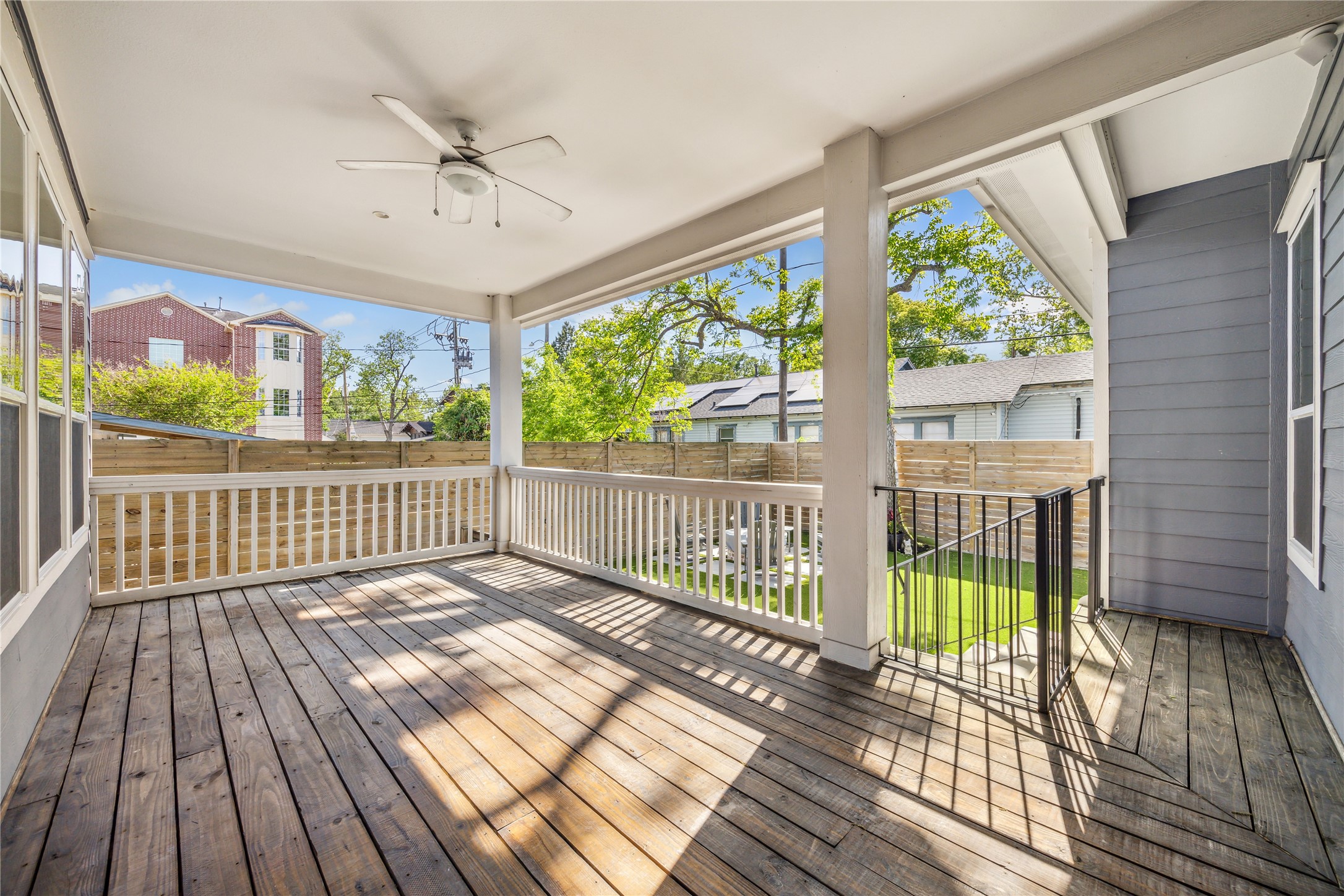 603 Vincent Street Houston, TX 77009 - Photo 22 of 26 An entertainers delight! You will love spending time under the expansive covered porch + steps leading to the low maintenance turfed back green space!