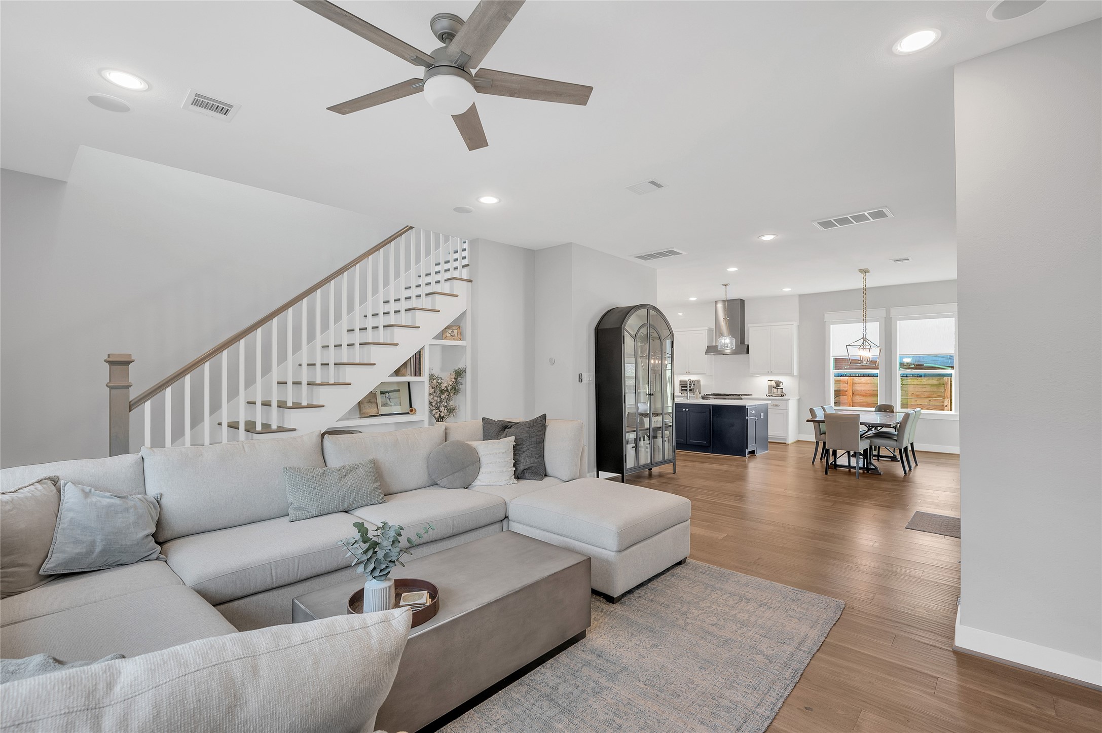 603 Vincent Street Houston, TX 77009 - Photo 26 of 26 Spacious open concept floorplan flooded with natural lighting. Neutral paint throughout + windows dressed with shades.