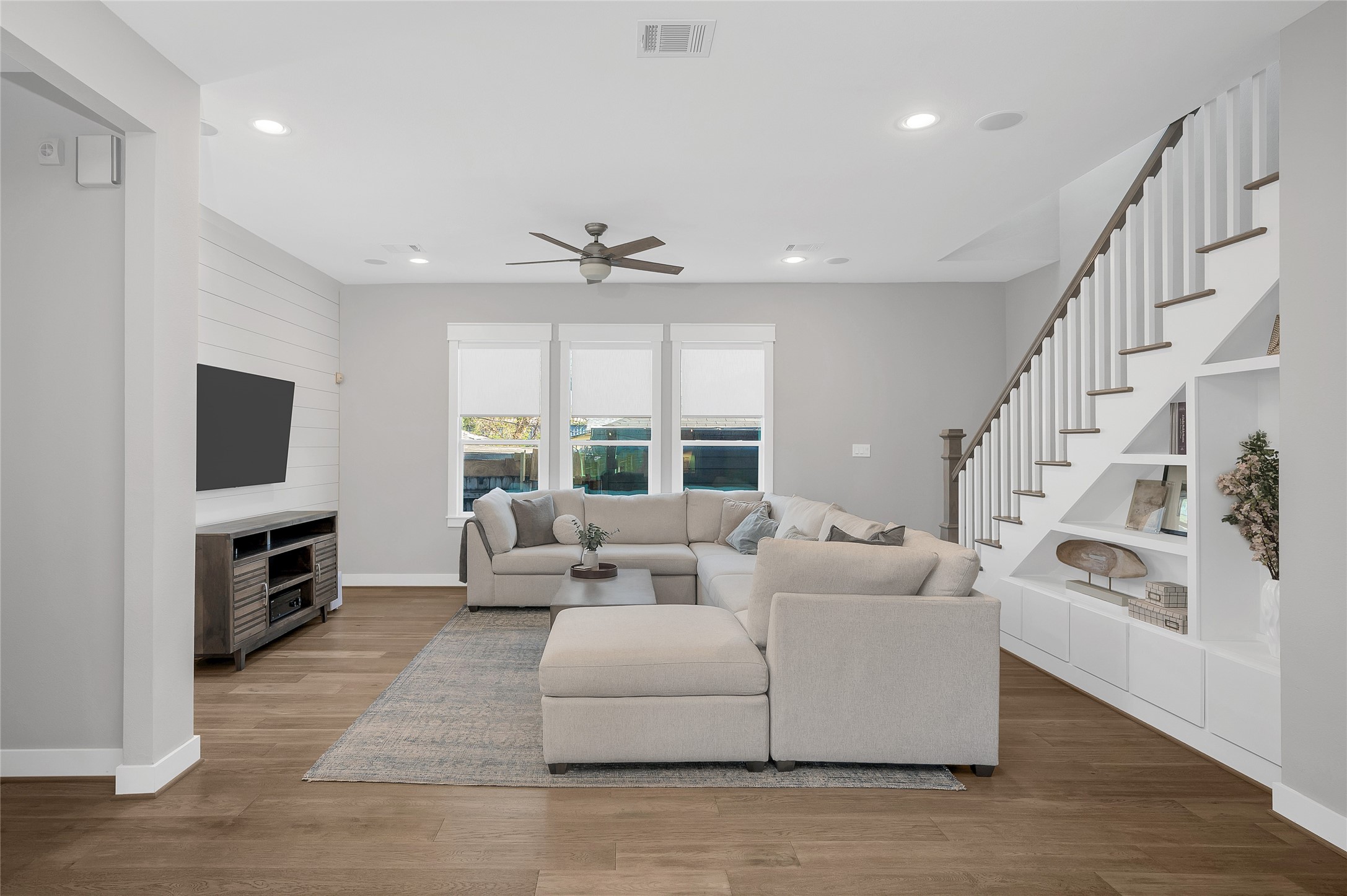 603 Vincent Street Houston, TX 77009 - Photo 7 of 26 Alternate living room perspective. Note the custom built in shelving perfect for family photos/display.