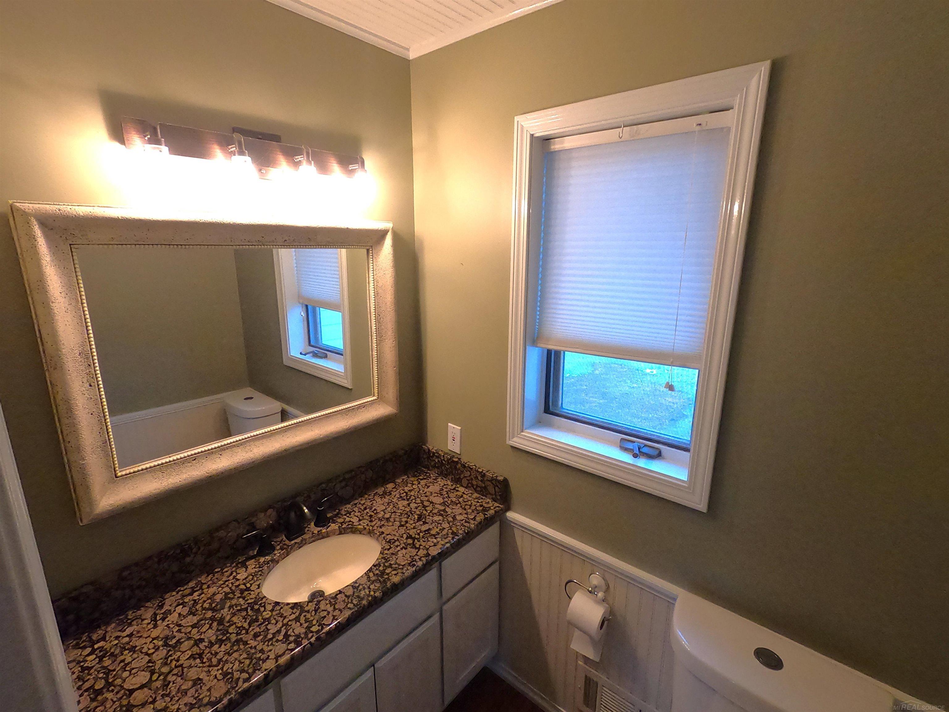 18450 Pratt Road Armada, MI 48005 - Photo 17 of 50 First Floor Lavatory is near the rear main entrance
