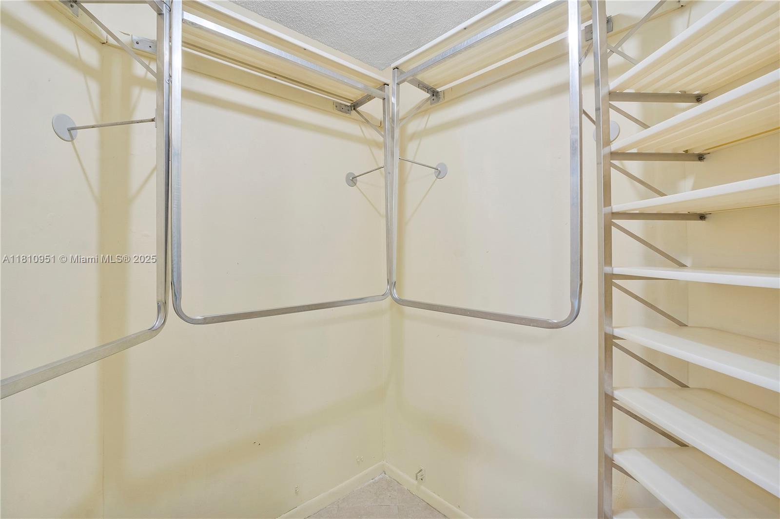 9091 Lime Bay Boulevard, Unit 110 Tamarac, FL 33321 - Photo 27 of 40 a bathroom with a shower