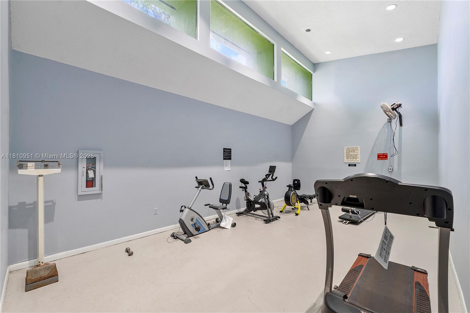 9091 Lime Bay Boulevard, Unit 110 Tamarac, FL 33321 - Photo 36 of 40 a room with gym equipment and equipment