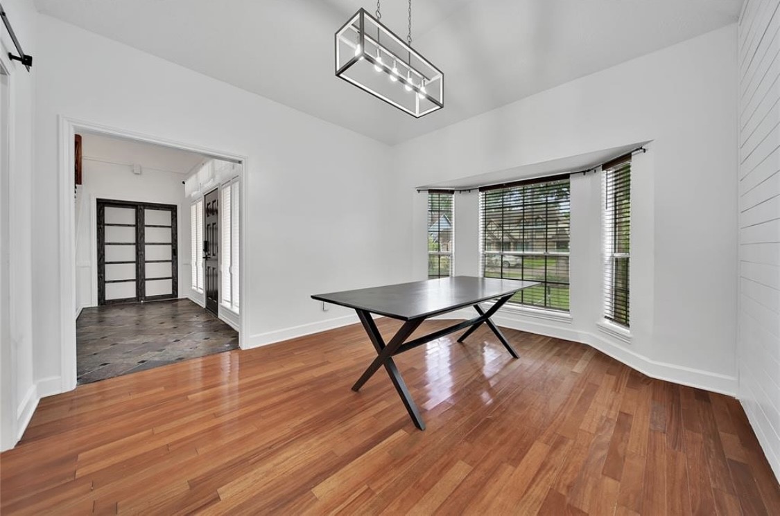 12922 Lentando Drive Cypress, TX 77429 - Photo 14 of 41 a view of a room with wooden floor water view and windows