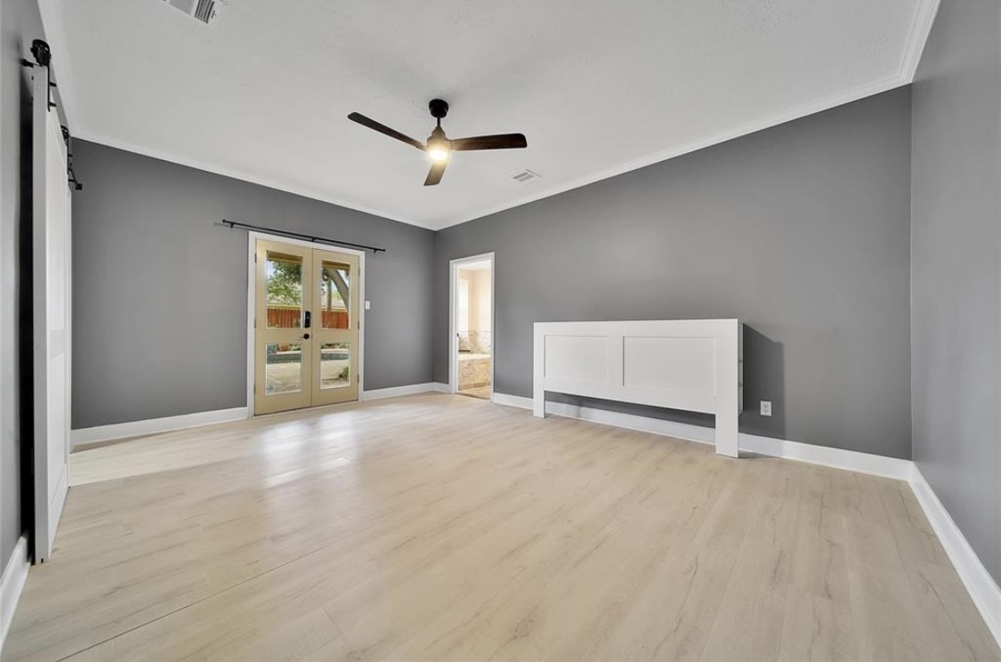 12922 Lentando Drive Cypress, TX 77429 - Photo 18 of 41 a view of an empty room with a window