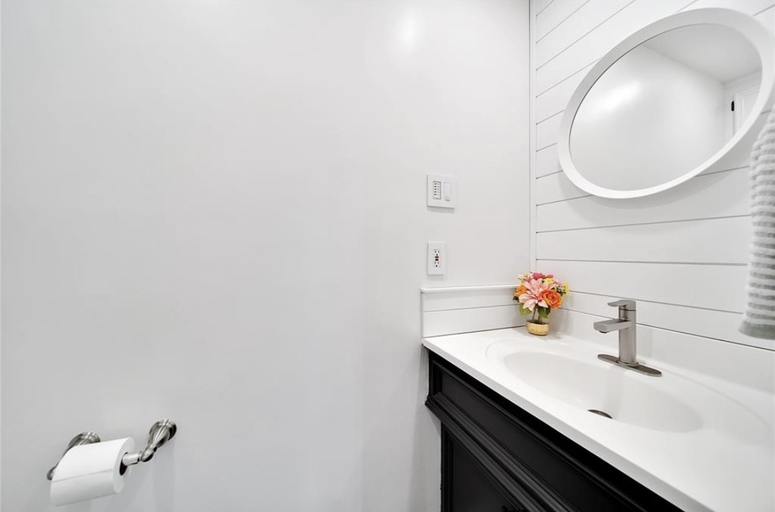 12922 Lentando Drive Cypress, TX 77429 - Photo 22 of 41 a bathroom with a sink and a mirror