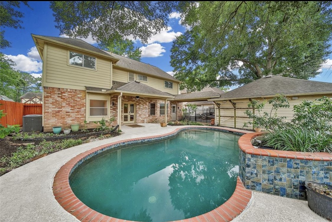 12922 Lentando Drive Cypress, TX 77429 - Photo 34 of 41 a view of a house with swimming pool