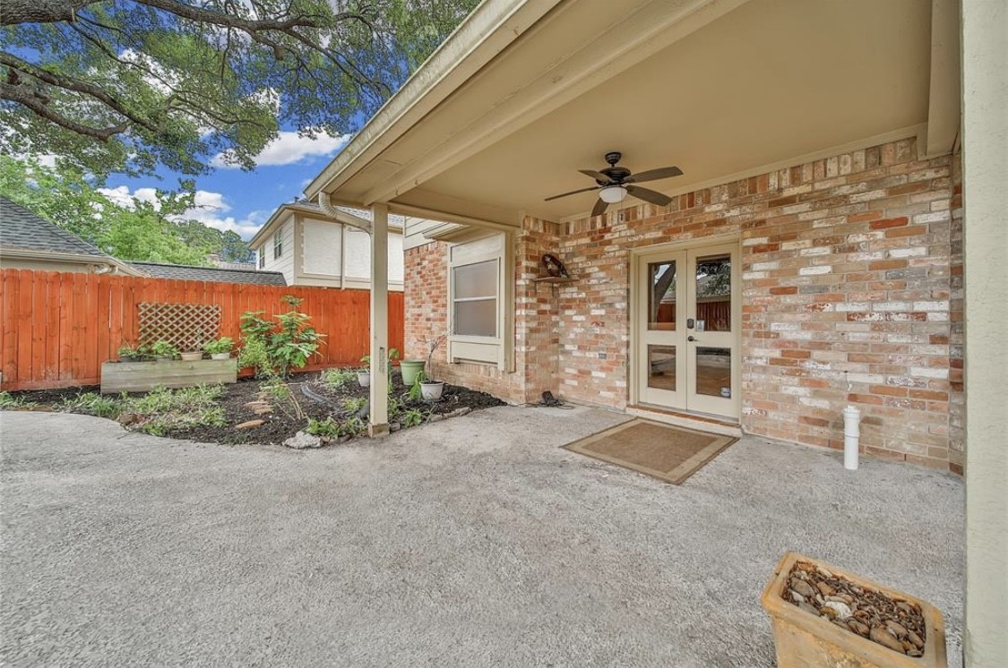 12922 Lentando Drive Cypress, TX 77429 - Photo 36 of 41 a front view of a house with a yard and garage