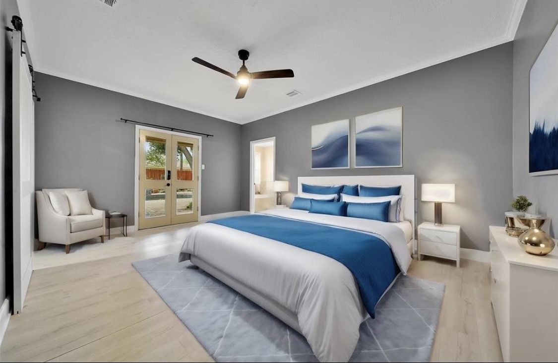 12922 Lentando Drive Cypress, TX 77429 - Photo 5 of 41 a bedroom with a bed couch and window