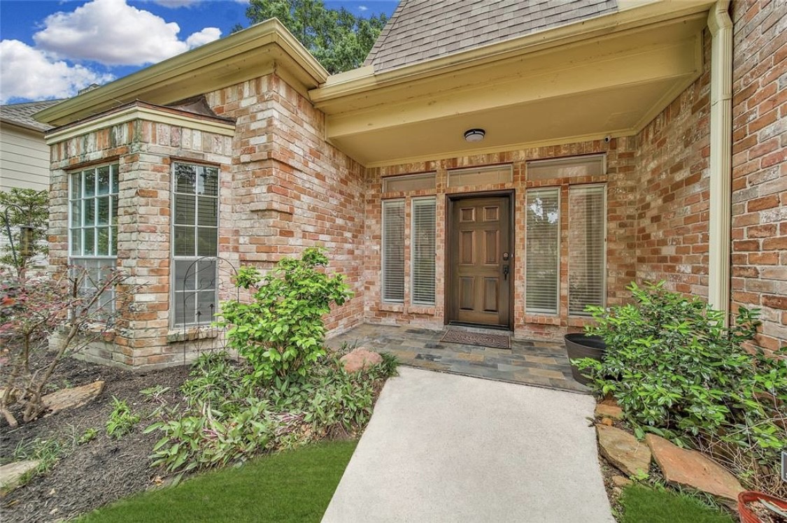 12922 Lentando Drive Cypress, TX 77429 - Photo 7 of 41 a front view of a house with garden