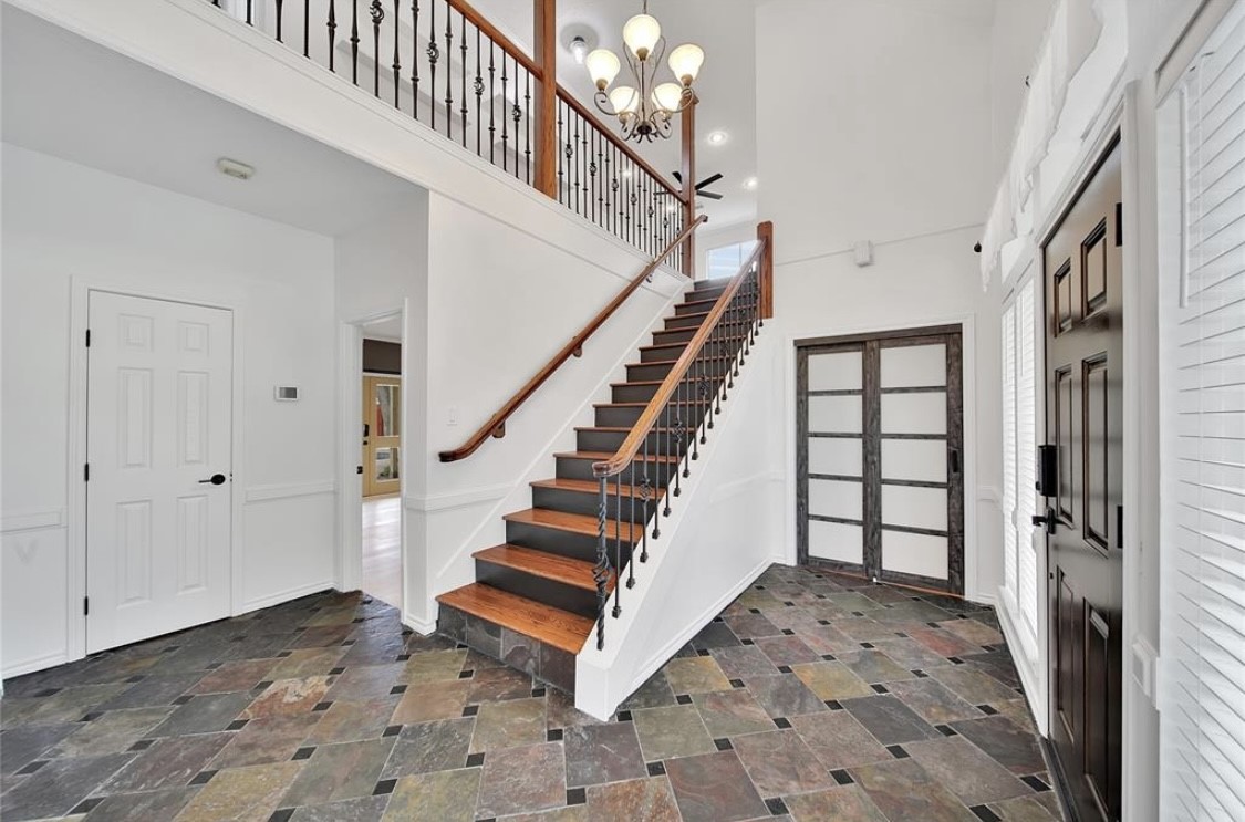 12922 Lentando Drive Cypress, TX 77429 - Photo 8 of 41 a view of entryway with stairs and wooden floor