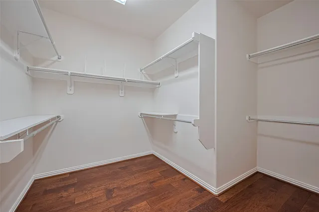 a view of an empty walk in closet