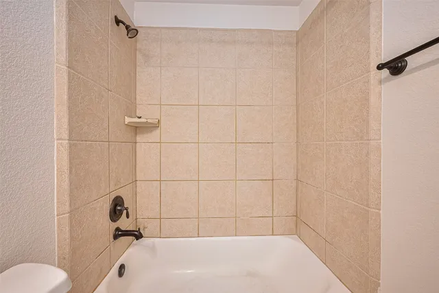 a bathroom with a sink and toilet