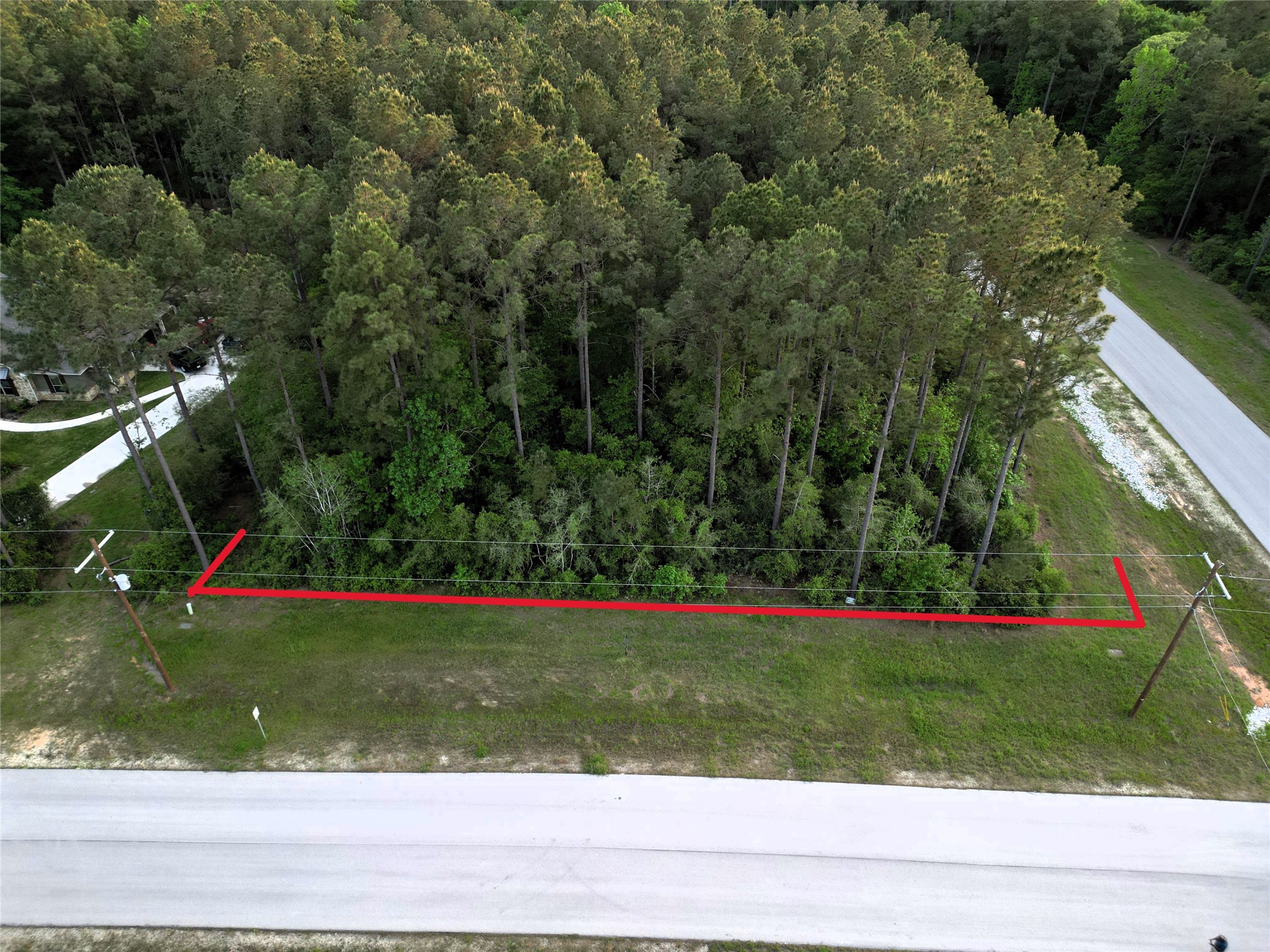 Tbd Copperleaf Road Huntsville, TX 77340 - Photo 1 of 24 a view of a volley ball court