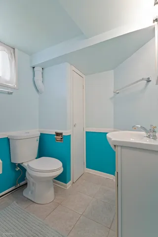 a bathroom with a sink and a toilet