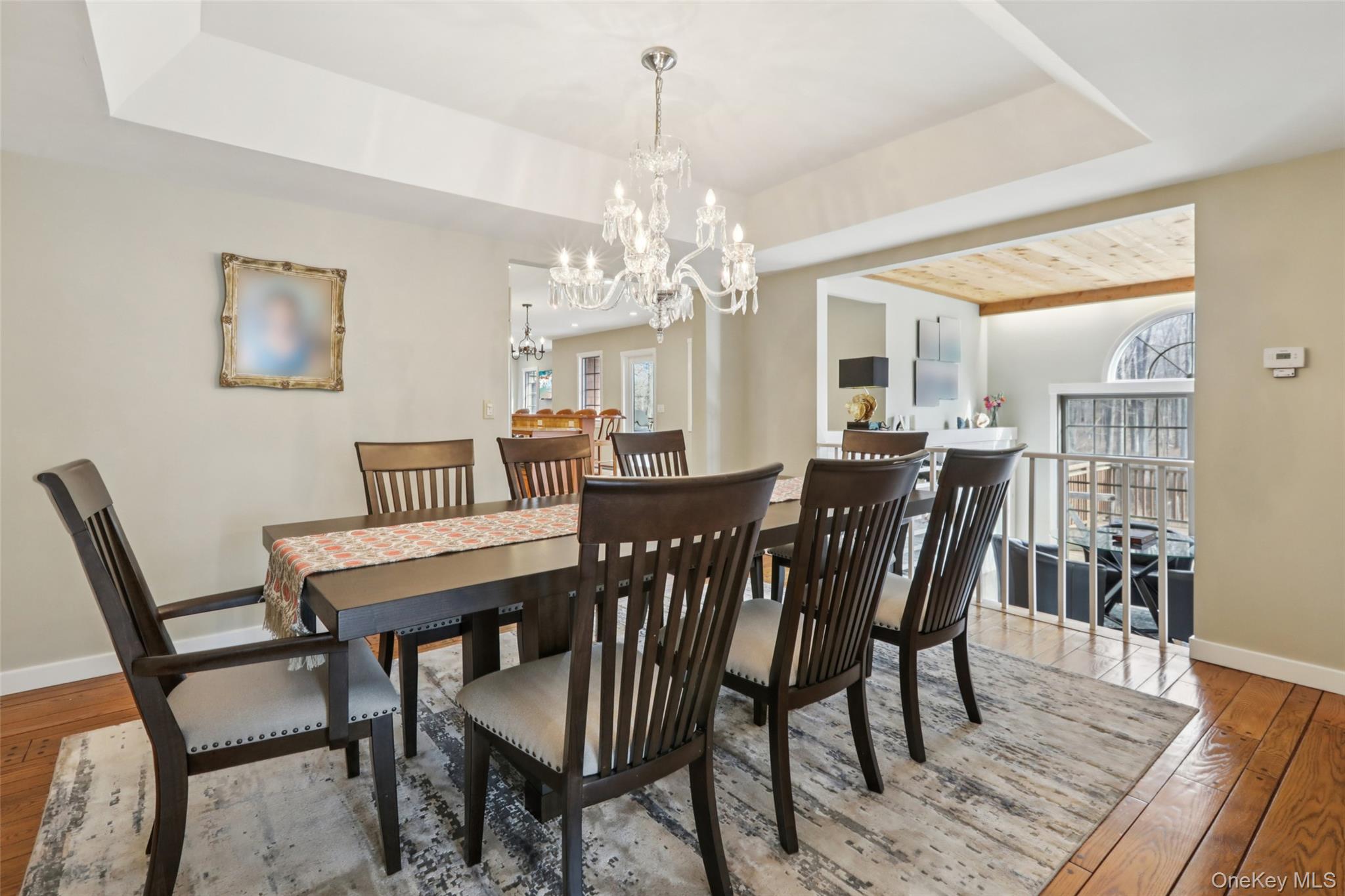 27 Cat Ridge Road North Salem, NY 10560 - Photo 13 of 45 a view of a dining room with furniture and wooden floor