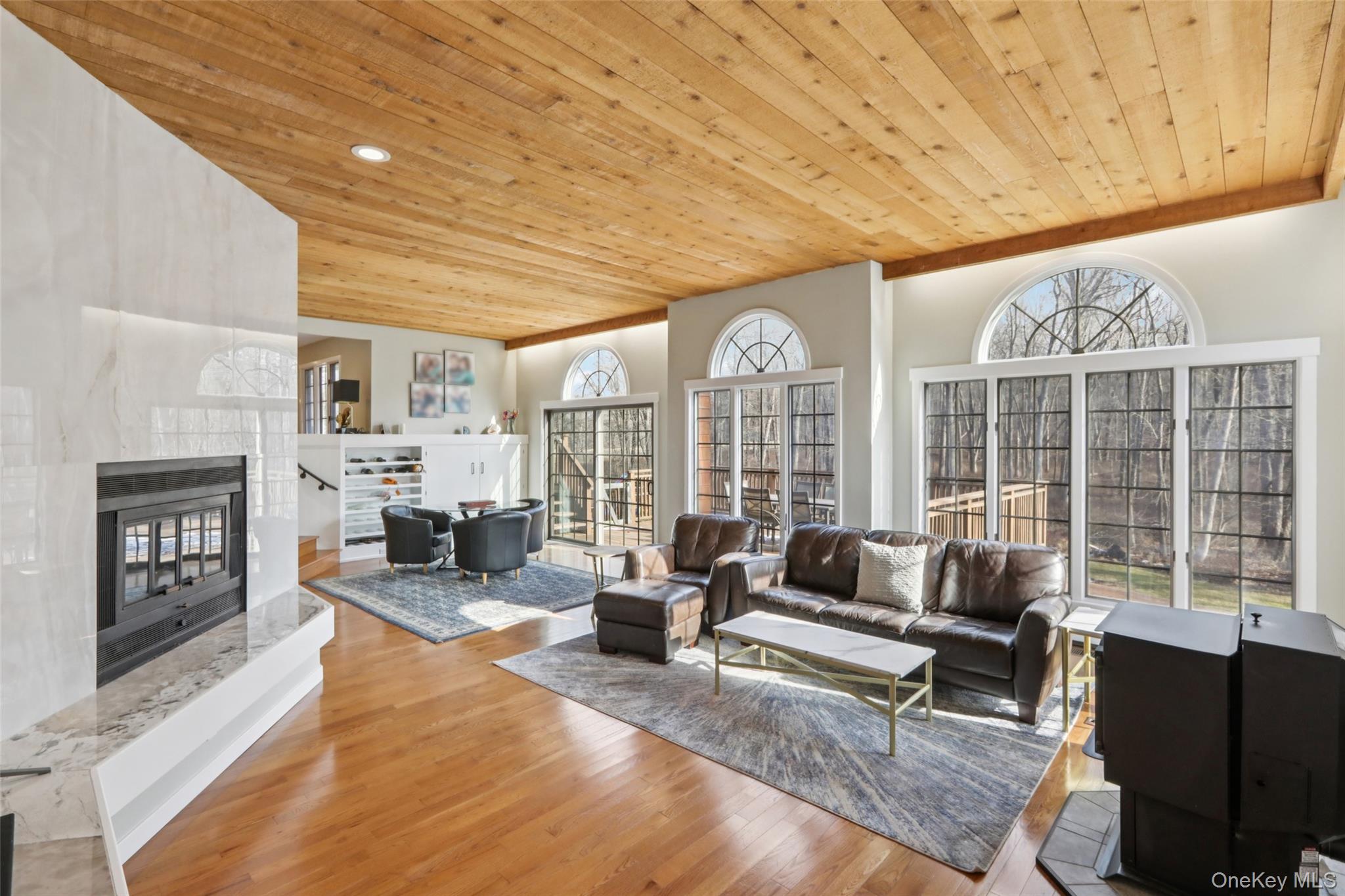 27 Cat Ridge Road North Salem, NY 10560 - Photo 15 of 46 a living room with furniture large window and flat screen tv