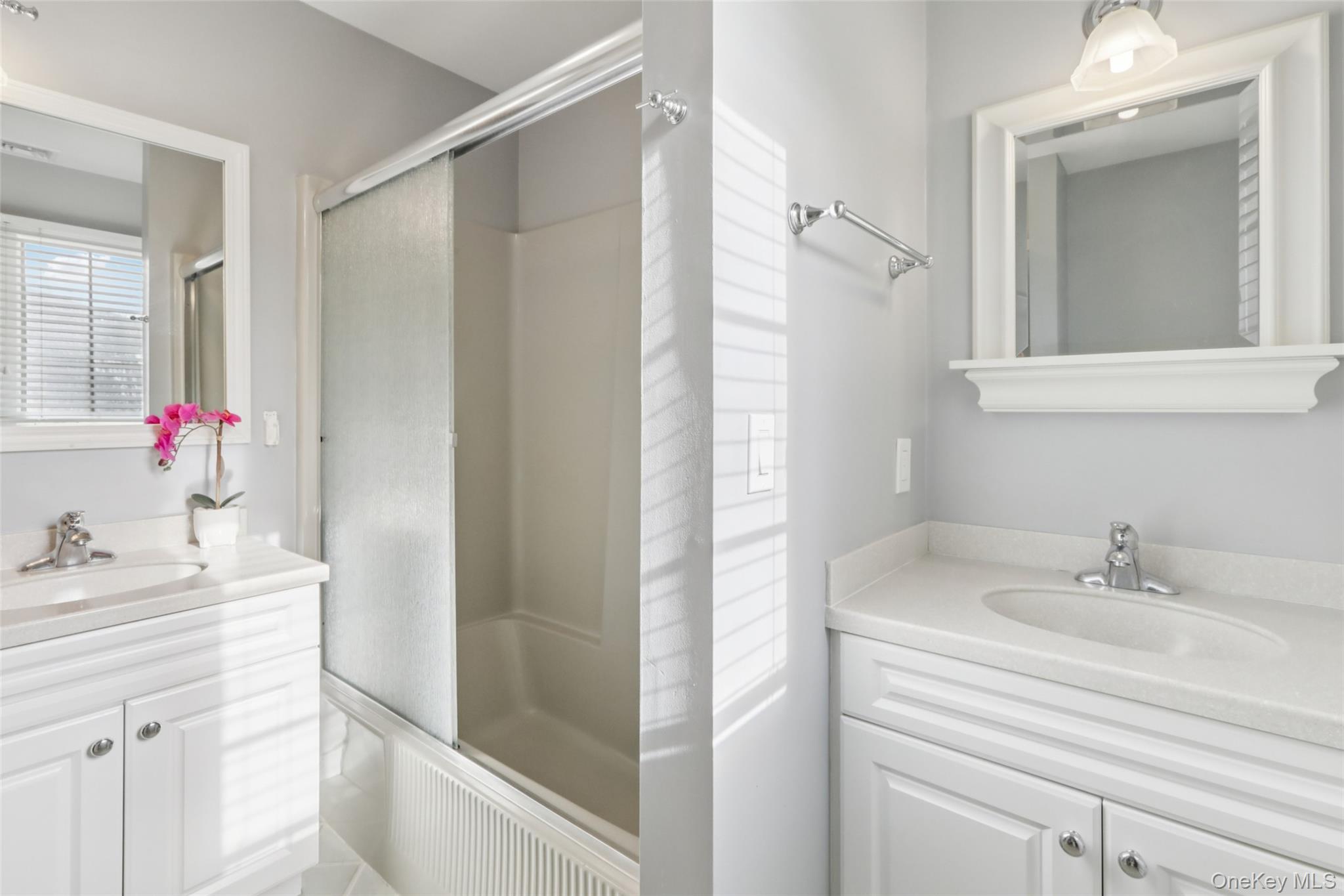 27 Cat Ridge Road North Salem, NY 10560 - Photo 25 of 45 a bathroom with a sink vanity and a mirror
