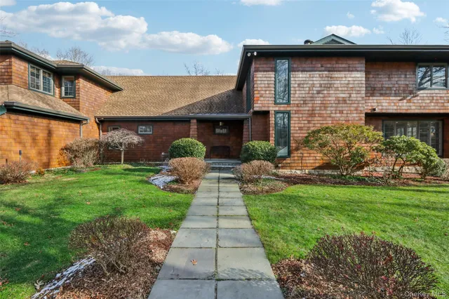 a front view of house with yard