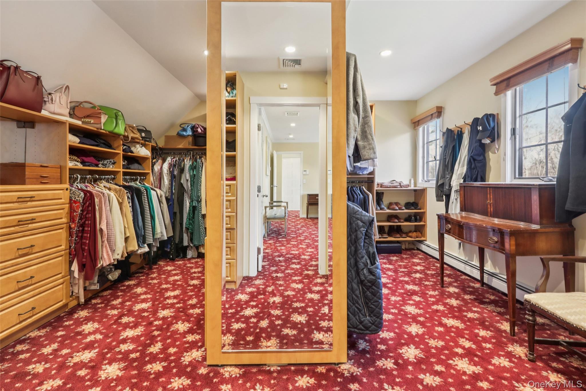 27 Cat Ridge Road North Salem, NY 10560 - Photo 33 of 46 Walk in closet with carpet flooring, a baseboard radiator, and vaulted ceiling