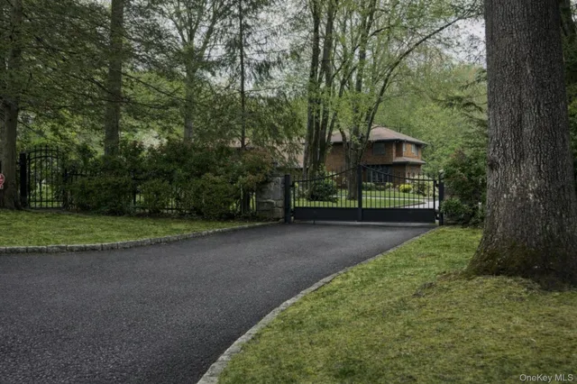 a living room with furniture a fireplace and a table