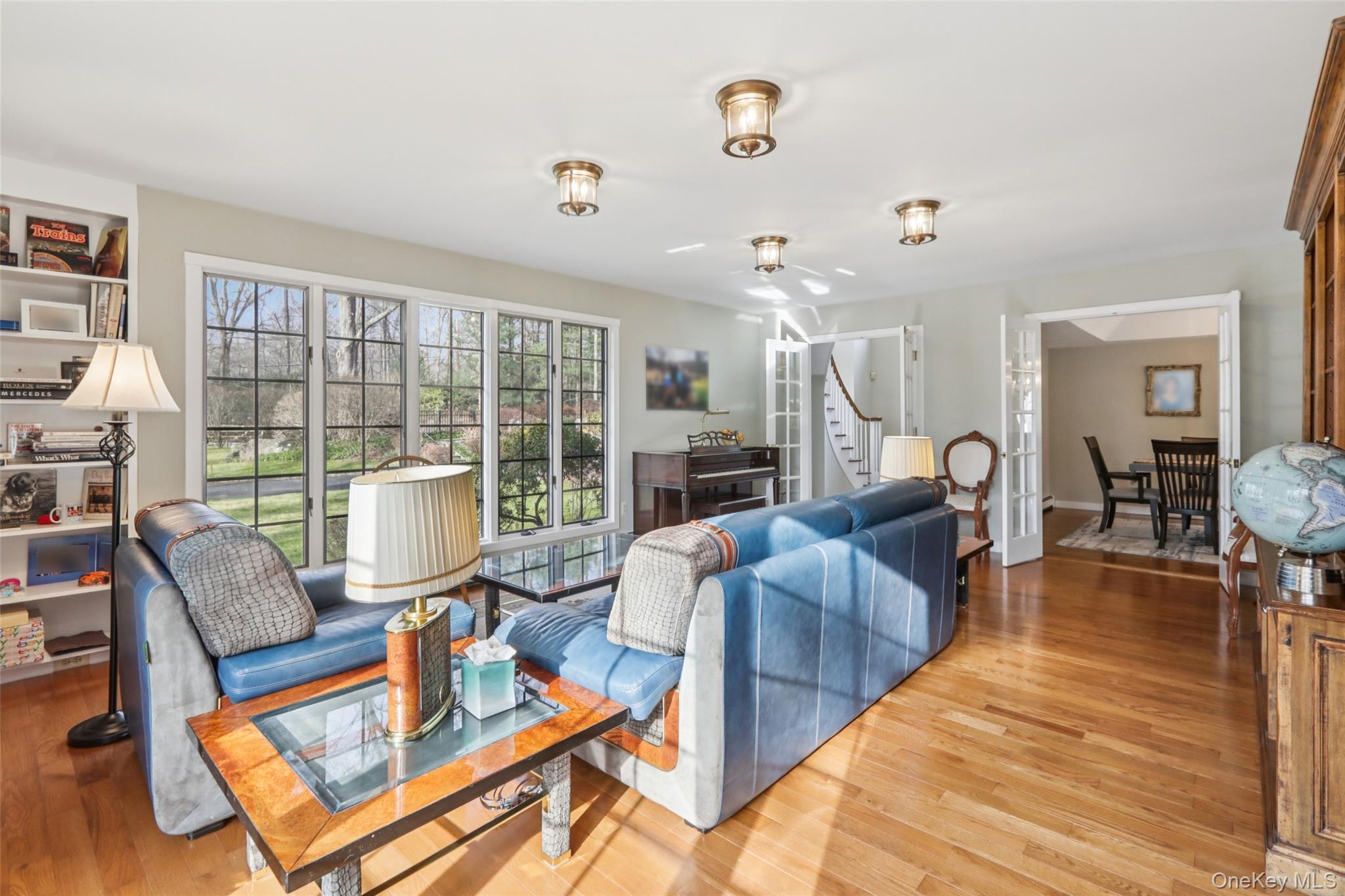 27 Cat Ridge Road North Salem, NY 10560 - Photo 10 of 46 a living room with furniture a fireplace and a table
