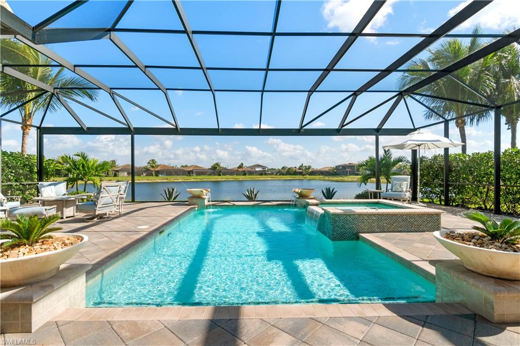 a view of a swimming pool with a patio