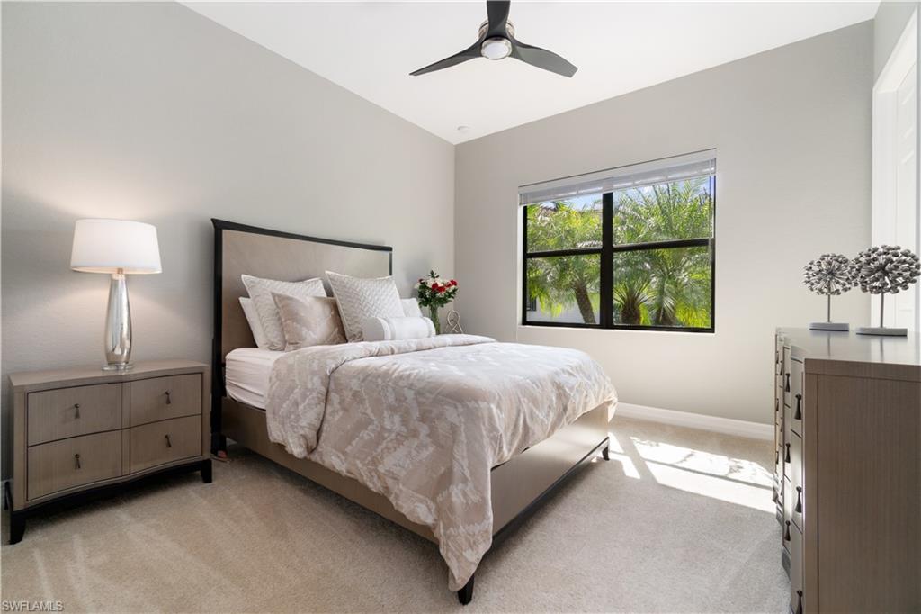 4467 Caldera Circle Naples, FL 34119 - Photo 29 of 50 a bedroom with a bed and a window
