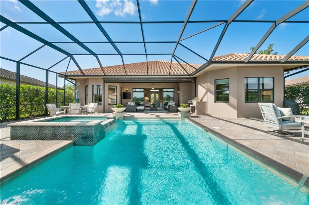 4467 Caldera Circle Naples, FL 34119 - Photo 40 of 50 a view of swimming pool with patio