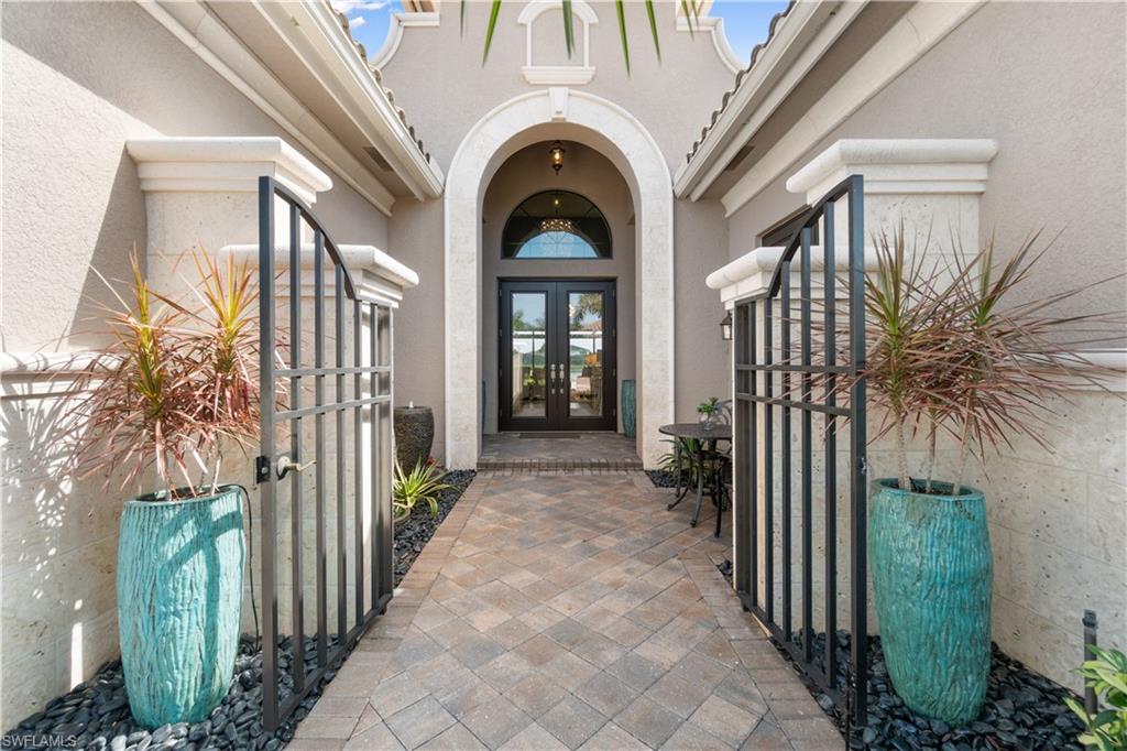 4467 Caldera Circle Naples, FL 34119 - Photo 6 of 50 a view of a entrance to house and balcony