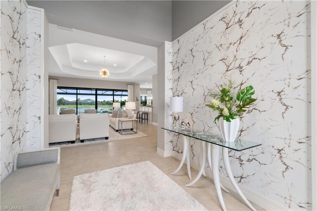 4467 Caldera Circle Naples, FL 34119 - Photo 8 of 50 a view of a living room