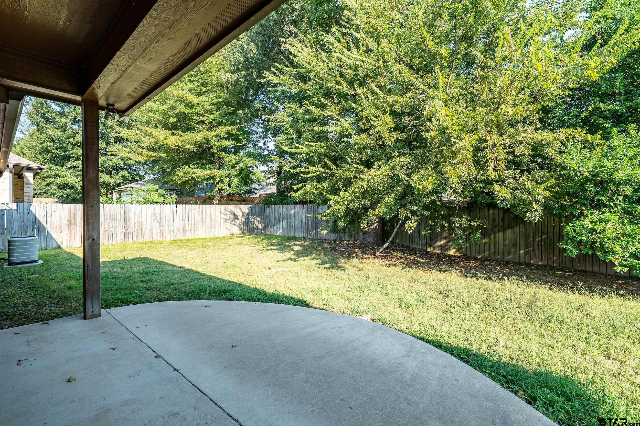 5841 Havens Trail Tyler, TX 75707 - Photo 19 of 21 a view of yard with swimming pool