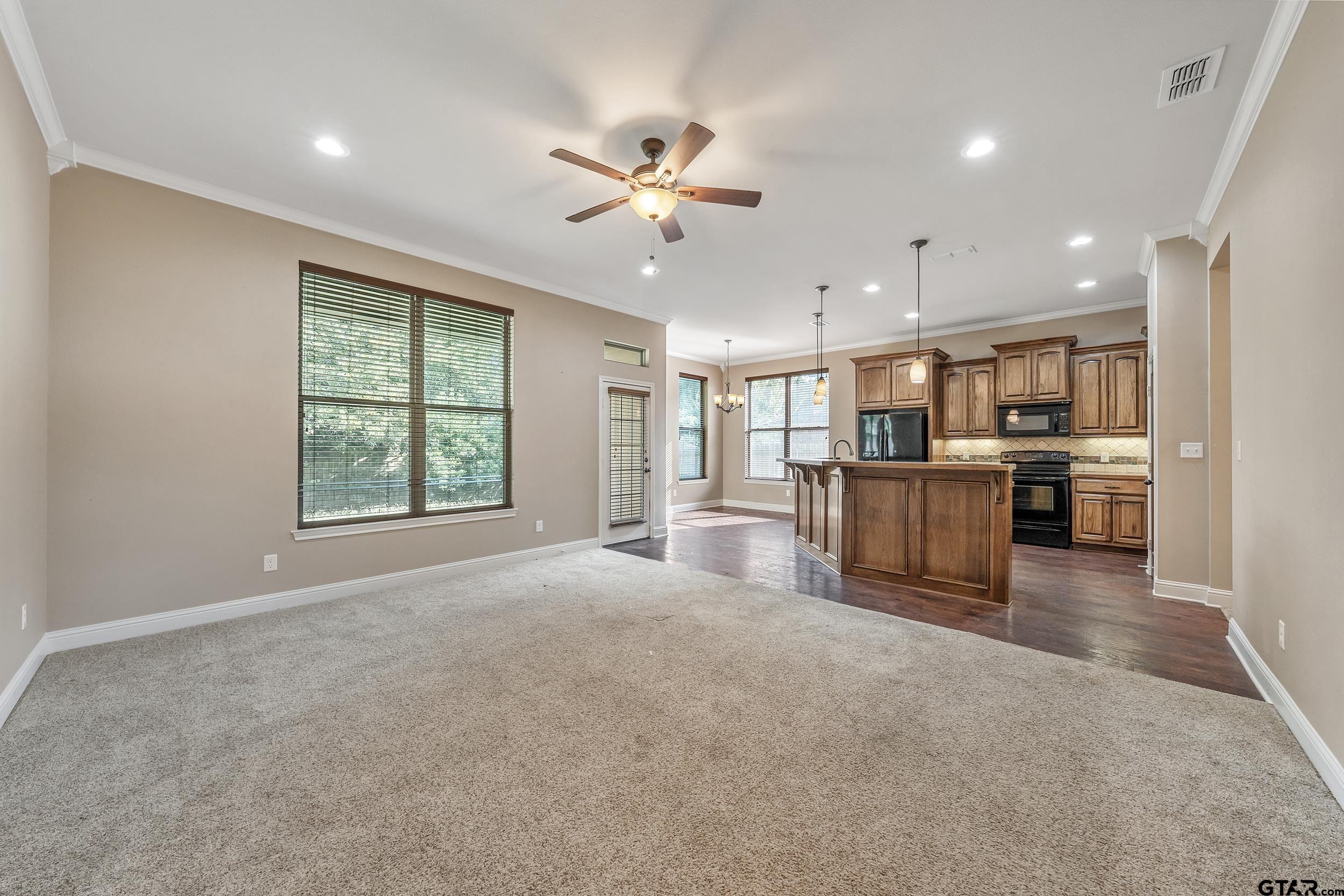 5841 Havens Trail Tyler, TX 75707 - Photo 4 of 21 a view of a kitchen with furniture and a window