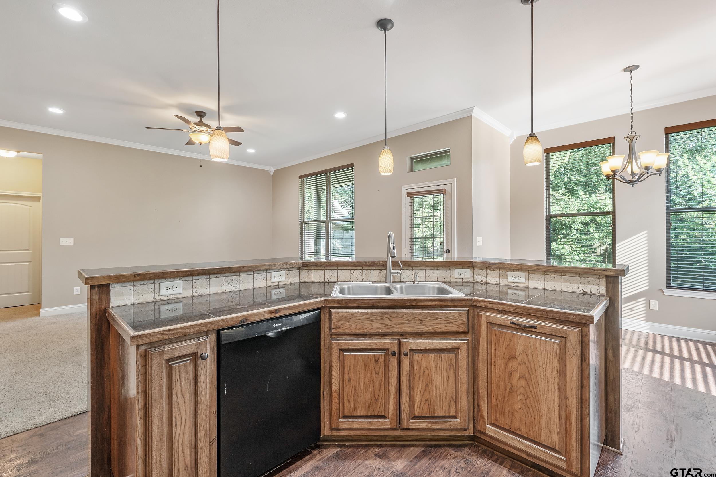 5841 Havens Trail Tyler, TX 75707 - Photo 7 of 21 a kitchen with a sink stove and cabinets