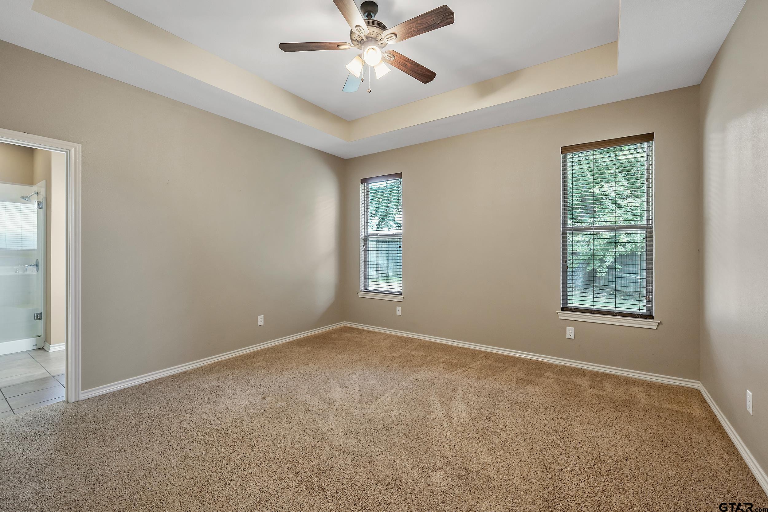 5841 Havens Trail Tyler, TX 75707 - Photo 10 of 21 a view of an empty room with a window