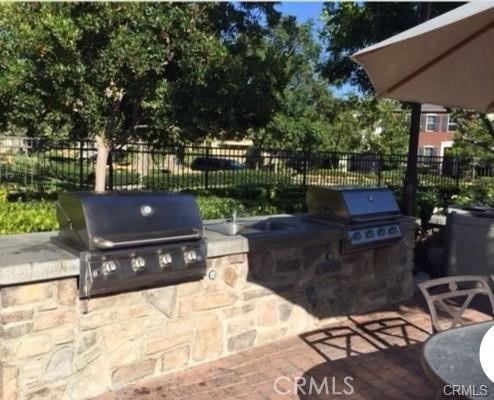 1415 Abelia Irvine, CA 92606 - Photo 11 of 13 a street view with sitting space