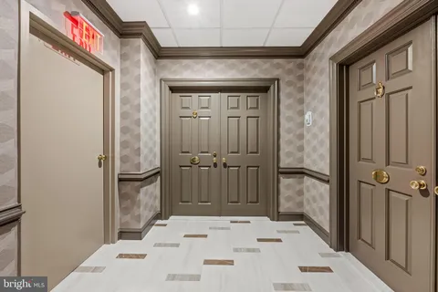 a bathroom with a tub and shower