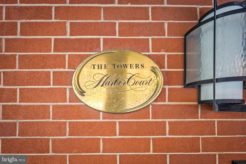 a view of a lake with tall buildings