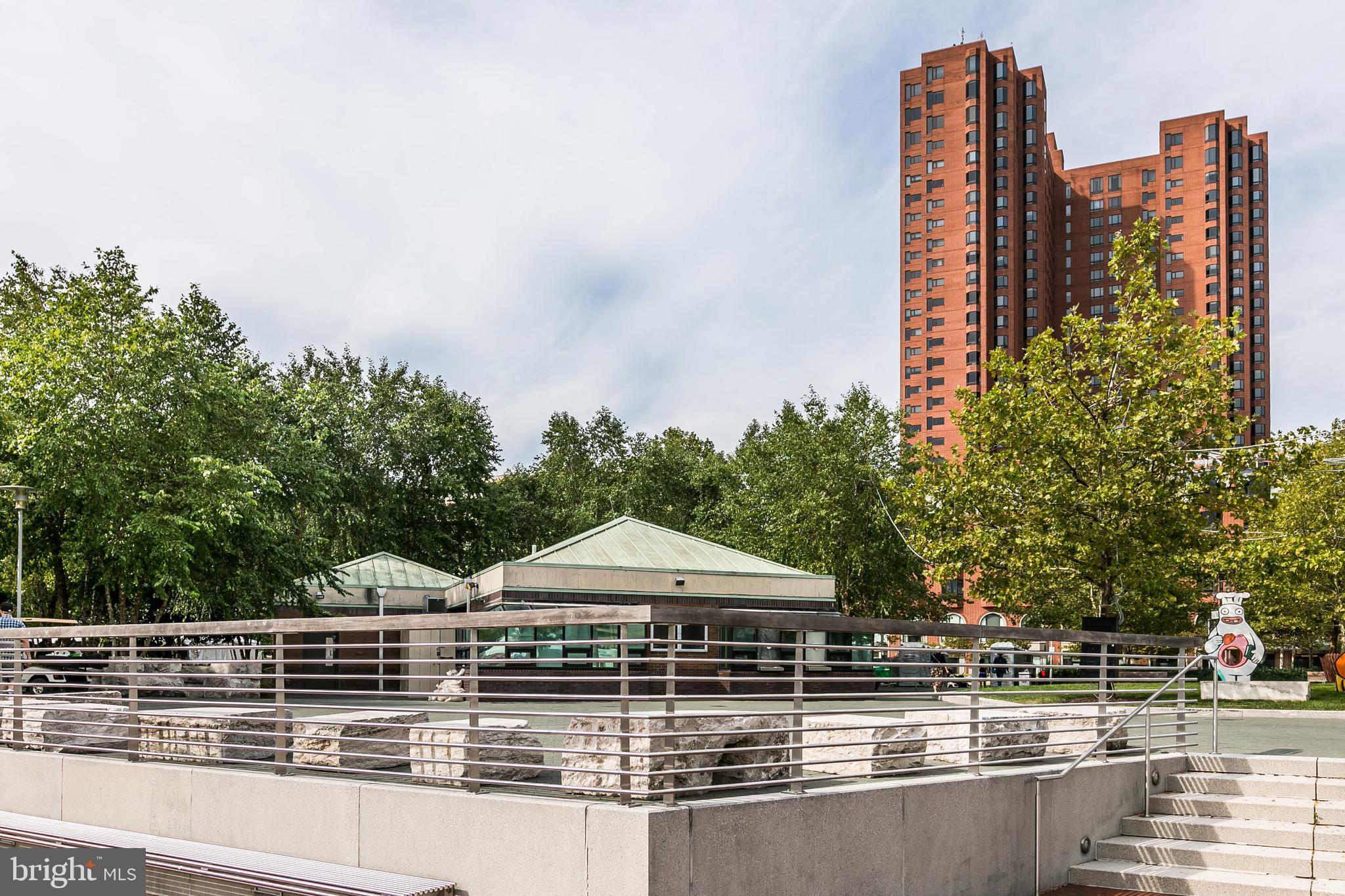 10 East Lee Street, Unit 1103 Baltimore, MD 21202 - Photo 31 of 42 a view of a lake with tall buildings