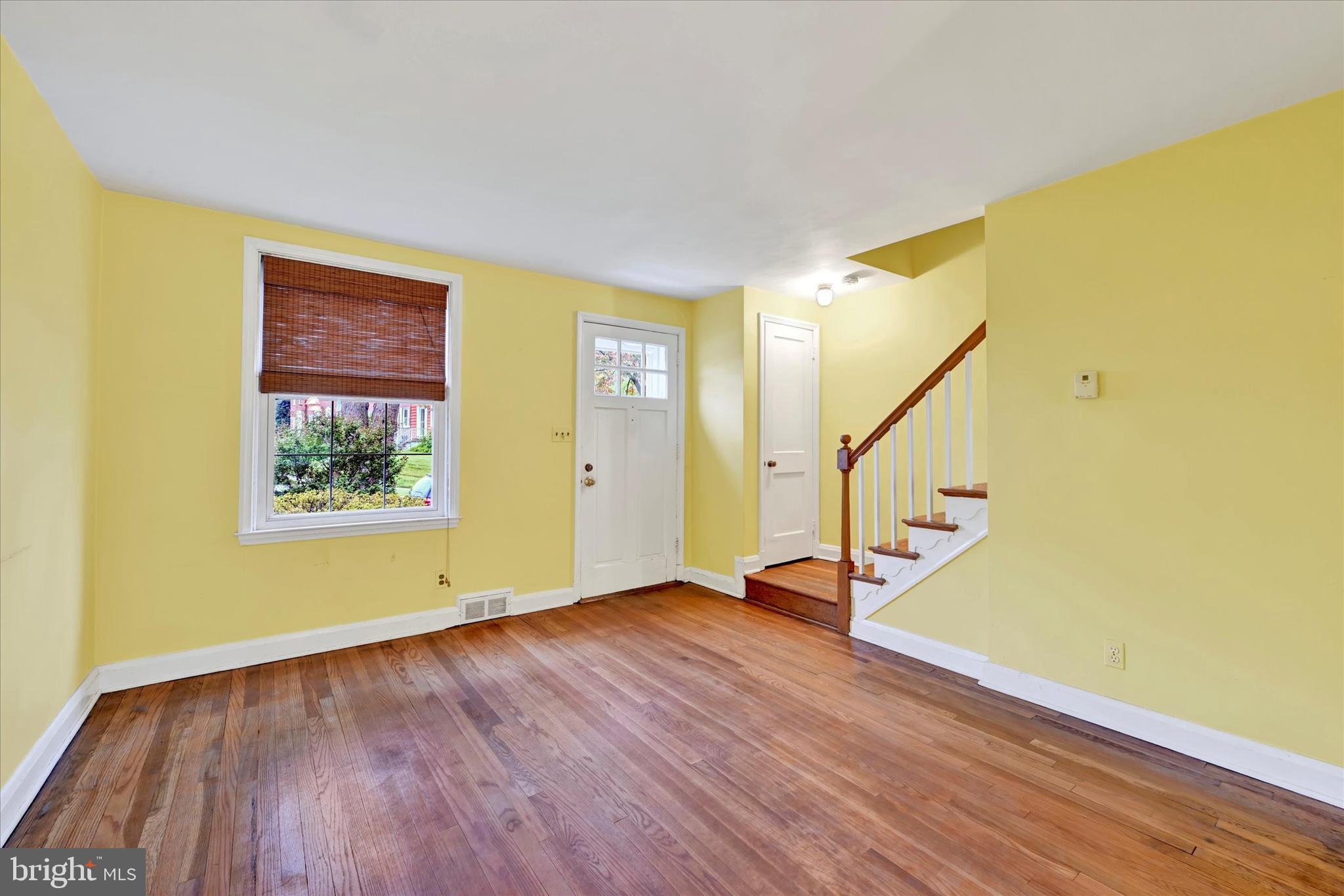 8445 Water Oak Road Baltimore, MD 21234 - Photo 5 of 17 a view of an entryway with wooden floor