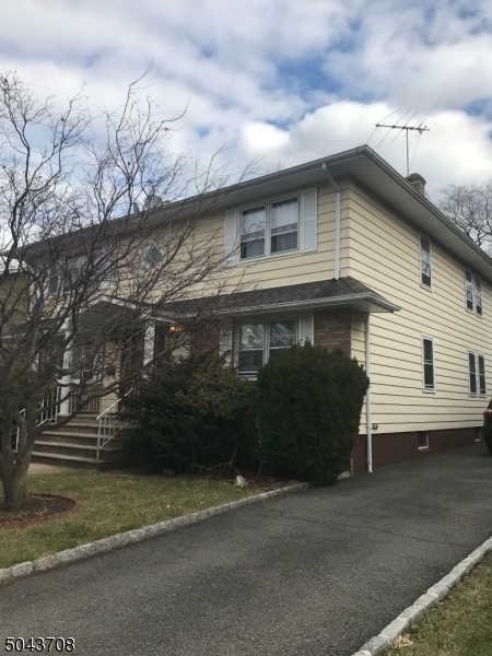 82 Cloverdale Road, Unit 1 Clifton, NJ 07013 - Photo 2 of 12 a front view of a house