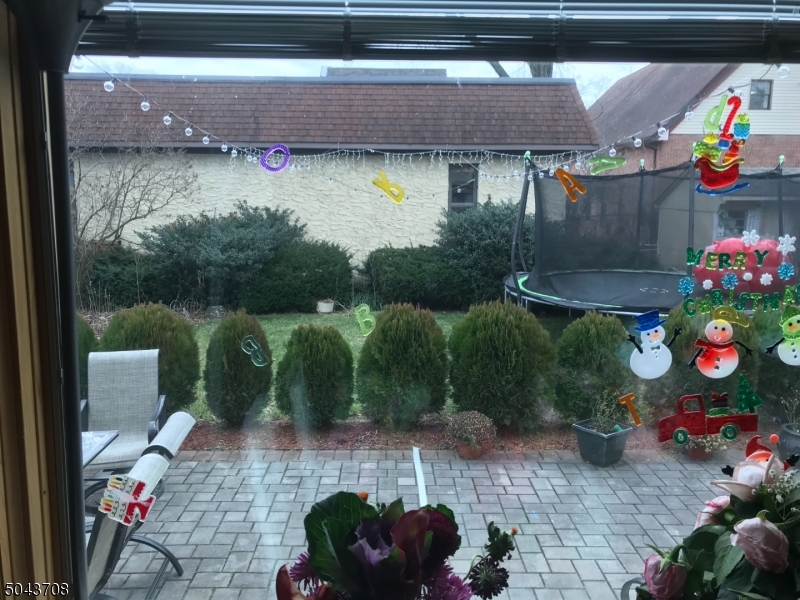 82 Cloverdale Road, Unit 1 Clifton, NJ 07013 - Photo 3 of 12 a view of outdoor space and yard