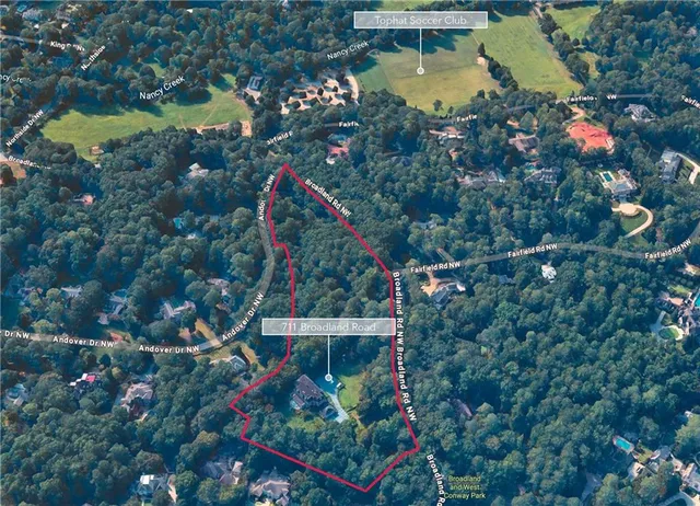 an aerial view of houses and roads