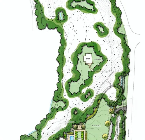 a close up of a white vase of flowers