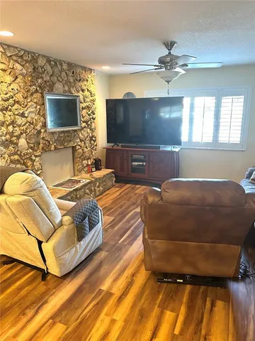 a living room with a couch and a flat screen tv