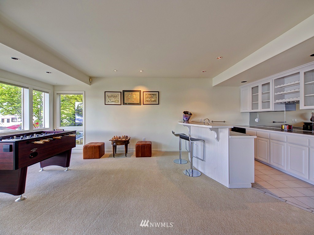 7023 Ripley Lane North Renton, WA 98056 - Photo 11 of 15 a living room with furniture and a open kitchen view
