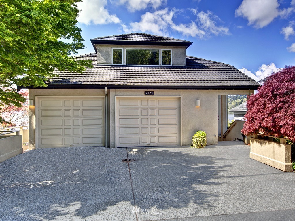 7023 Ripley Lane North Renton, WA 98056 - Photo 15 of 15 a front view of a house with a garden